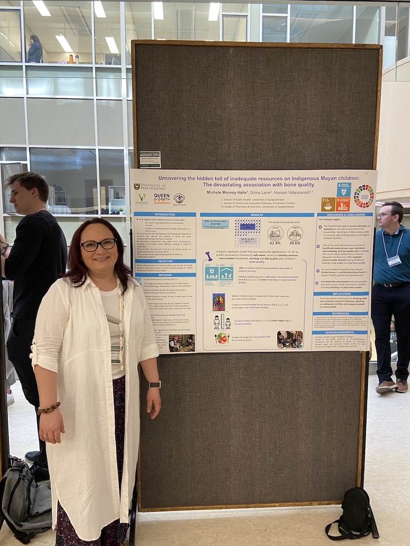 Michele Monroy-Valle with her Research Expo poster